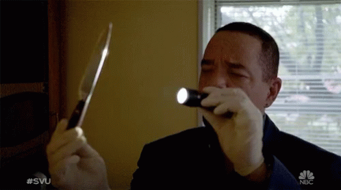 Checking Out Knife GIF - Checking Out Knife Inspecting GIFs