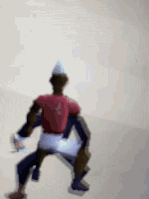 a blurry picture of a person wearing a birthday hat