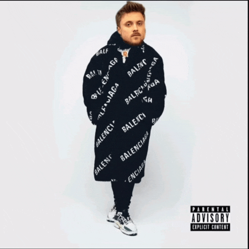 a man is wrapped in a balenciaga blanket on a parental advisory cover