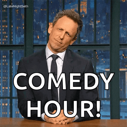 a man in a suit and tie says comedy hour