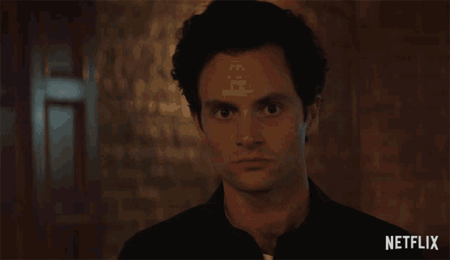 a close up of a man 's face with netflix written on the bottom