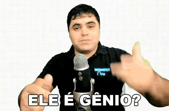 a man giving a thumbs up in front of a microphone with the words ele e genio below him