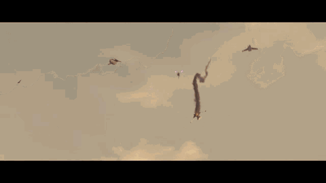 a person flying through the air with a sword