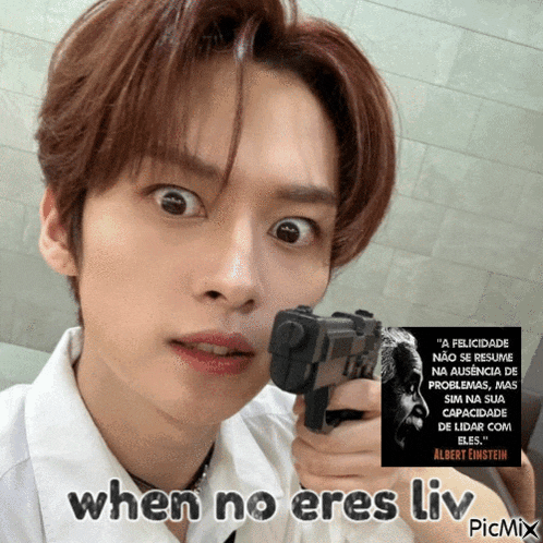 a picture of a man holding a gun with a quote from albert einstein