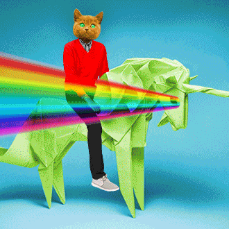 a cat is riding a green origami unicorn