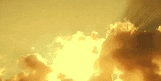 the sun is shining through the clouds in the sky at sunset