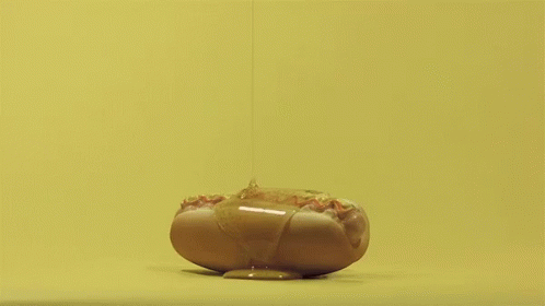Hotdog Sandwich Honey GIF - Hotdog Sandwich Honey Dripping GIFs