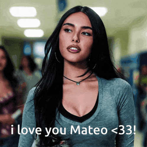 a woman in a gray shirt says " i love you mateo < 33 "