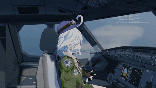a girl is sitting in the cockpit of an airplane with a patch on her jacket that says us air force
