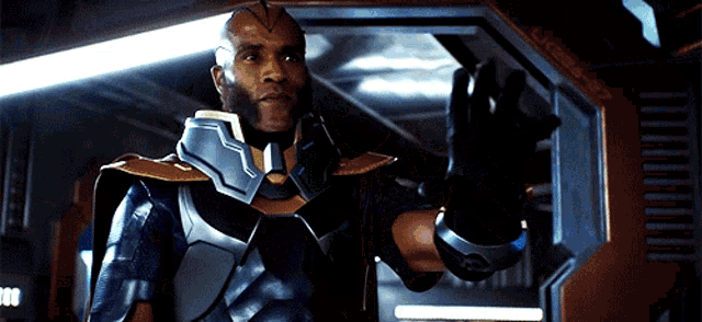 a man in a superhero costume is waving his hand in front of a door that says license