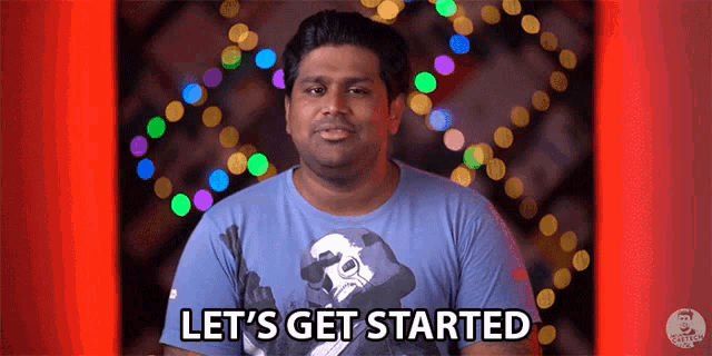 a man in a storm trooper shirt is saying let 's get started