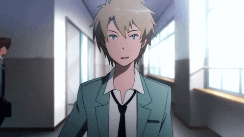 a man in a suit and tie is standing in a hallway