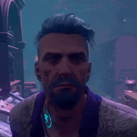 a man with blue hair and a beard is wearing a purple shirt and earrings .