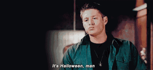 a man in a green jacket is talking about halloween .