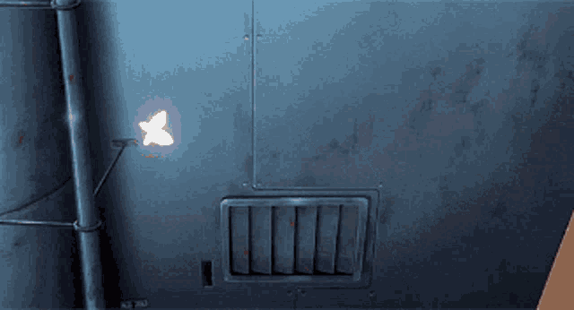 a butterfly is flying through a hole in the ceiling