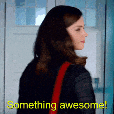 a woman is standing in front of a door with the words something awesome written on the bottom