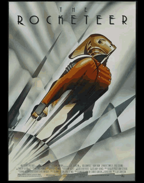 a movie poster for the rocketeer shows a man in a suit flying through the air