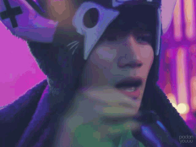 a close up of a person 's face with the words ' padan youuu ' on the bottom