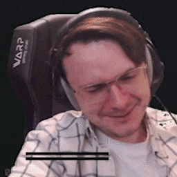 a man wearing glasses and headphones is sitting in a varp gaming chair