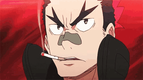 a man with a cigarette in his mouth looks angry