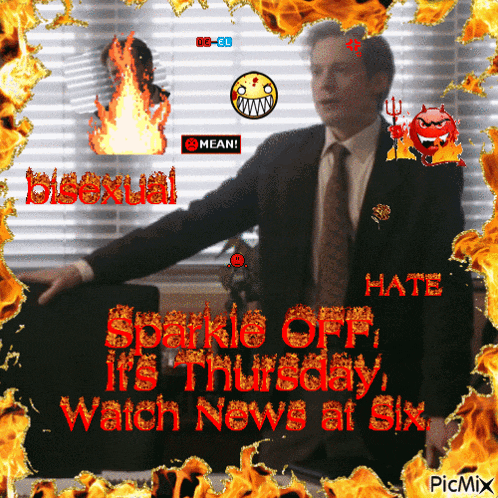 a man in a suit and tie stands in front of a sign that says " sparkie off "