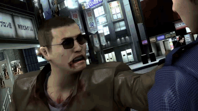 a man wearing sunglasses is being attacked by another man in front of a building with a sign that says ' hotel '