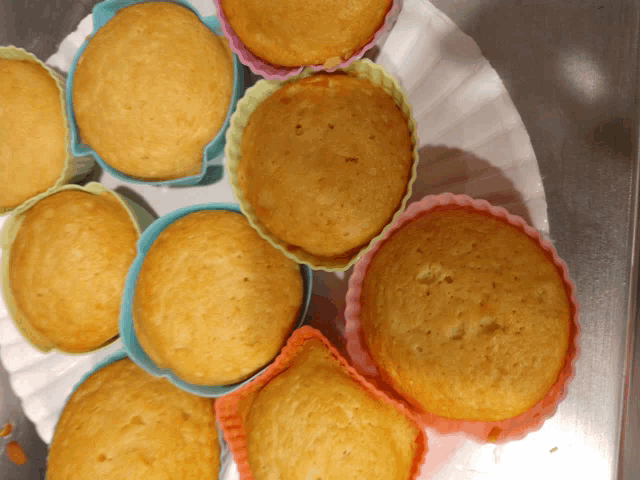 a bunch of cupcakes are sitting on a plate