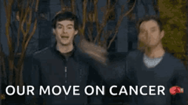 a man is raising his fist in the air with the words `` our move on cancer '' written below him .