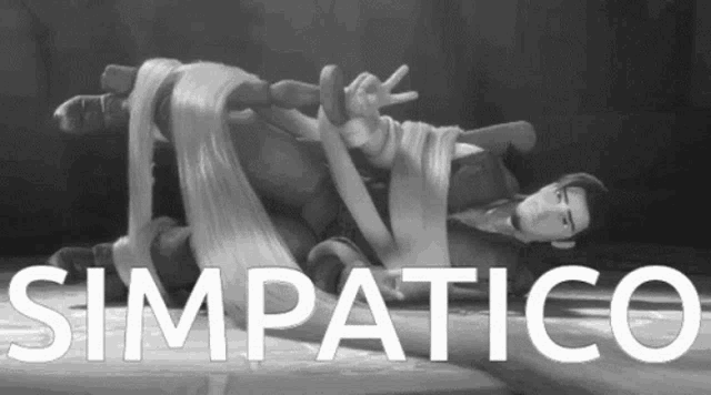 a black and white image of a man laying on the floor with the word simpatico written above him .