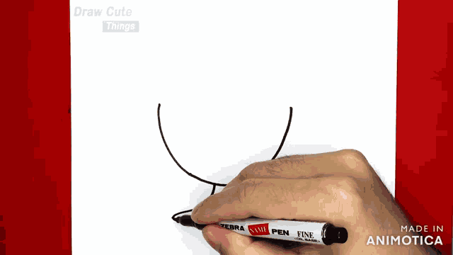 a zebra pen is being used to draw a drawing