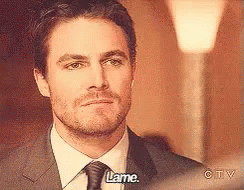 Oliver Queen Lame GIF - Oliver Queen Lame Bored GIFs