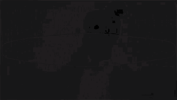 a close up of a white object with a black background