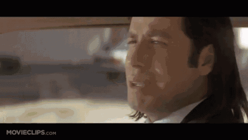 a close up of a man 's face in a car with movieclips.com at the bottom