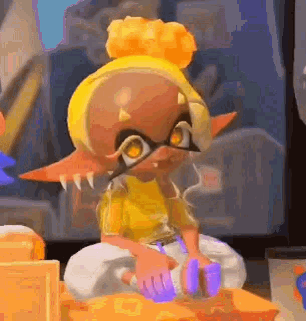 a cartoon character is sitting on a table with a bun on her head .