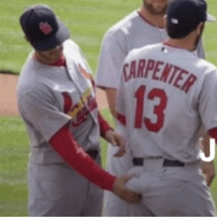 a baseball player with the number 13 on the back of his shirt