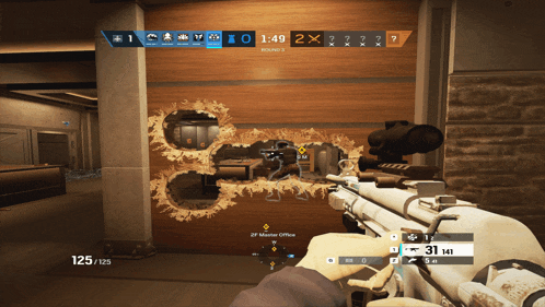 a person is holding a gun in front of a wall that has holes in it and says 2nd master office