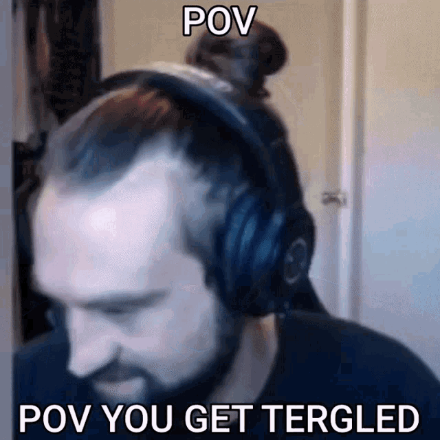 a man wearing headphones with the words pov you get tergled
