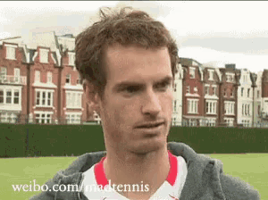 a man 's face is shown with the website weibo.com/madtennis at the bottom of the screen