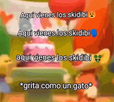 a blurred image of a cake with the words aqui vienes los skidbi