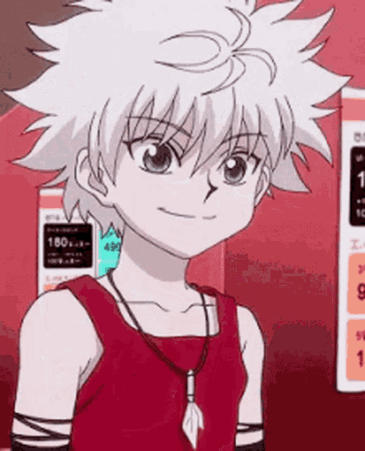 a young boy with white hair is wearing a red tank top and necklace .