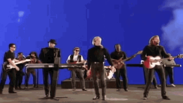 Were In A Band Maurice Gibb GIF - Were In A Band Maurice Gibb Robin Gibb GIFs