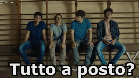a group of young men are sitting on a bench with the words " tutto a posto " written above them