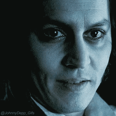 a close up of a man 's face with the words johnny depp gifs on the bottom right