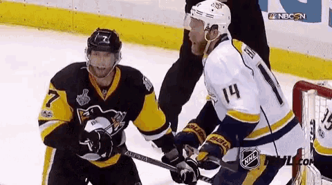 a hockey player with the number 14 on his back