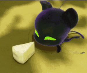 a purple cat with green eyes is eating a piece of cheese .