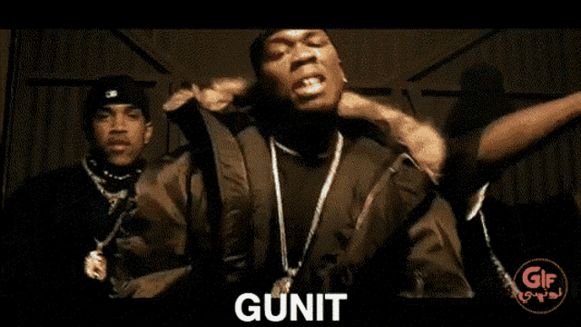two men sit in front of a range rover and the word gunit is on the bottom