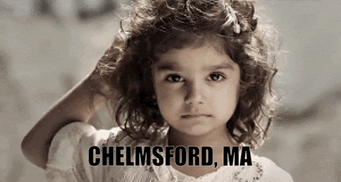 a little girl in a white dress with the words chelsford ma on the bottom