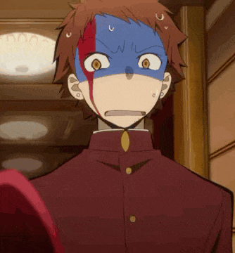 a man with a blue and red mask on his face has a surprised look on his face