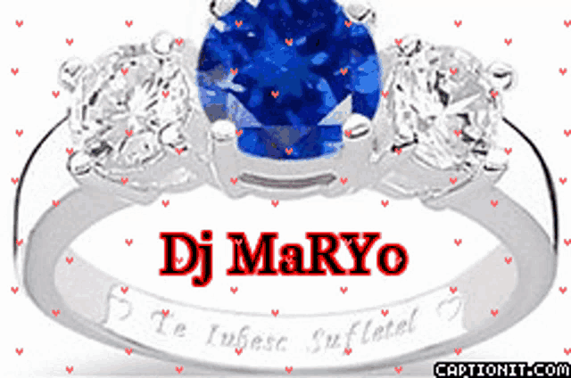 a ring with a blue stone and the name dj maryo on it