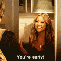a woman says you 're early while talking to a man